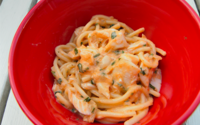 Pasta met vis en romige paprika tomatensaus